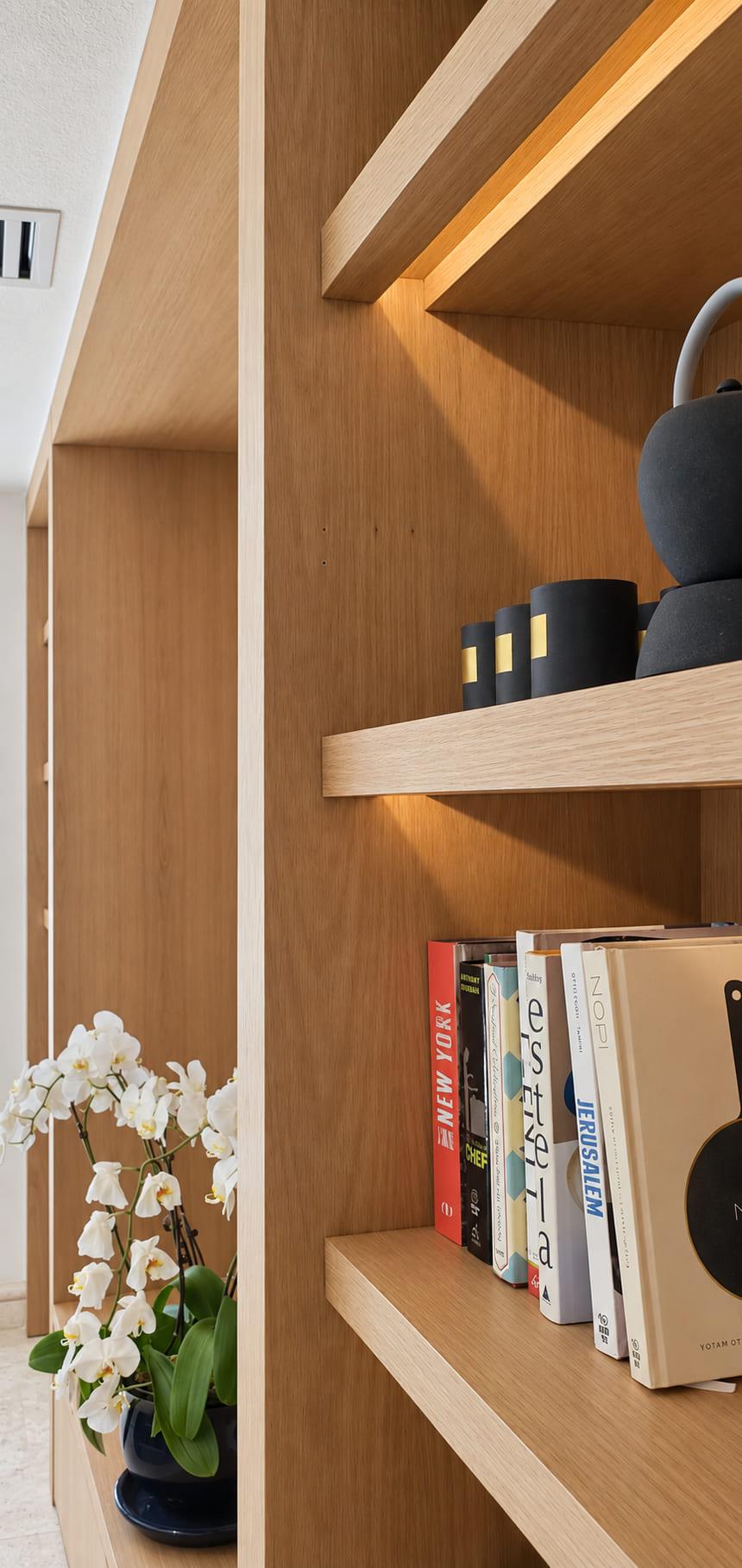 White oak shelves lit from behind the front edge