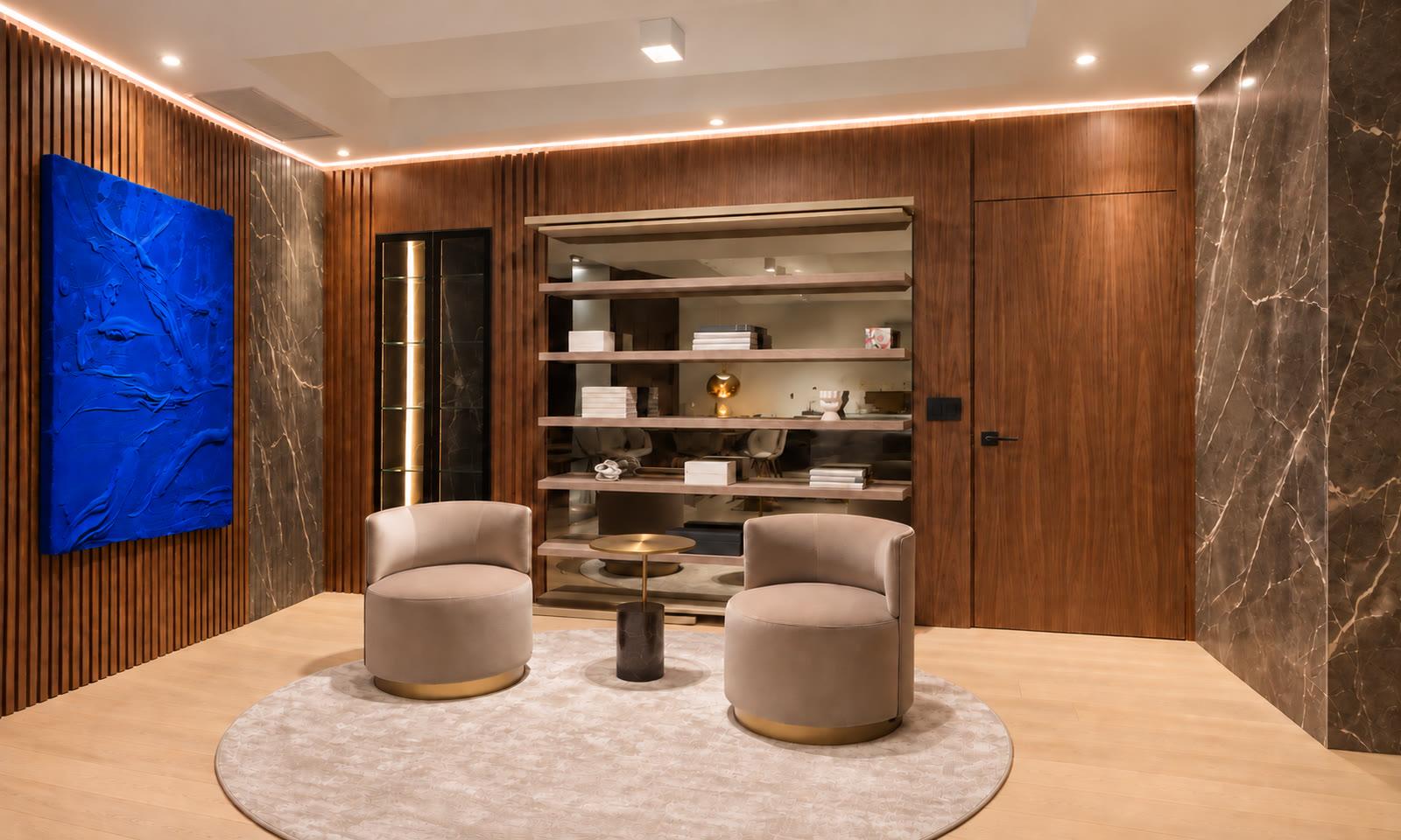 The finished room in walnut, marble and cove light