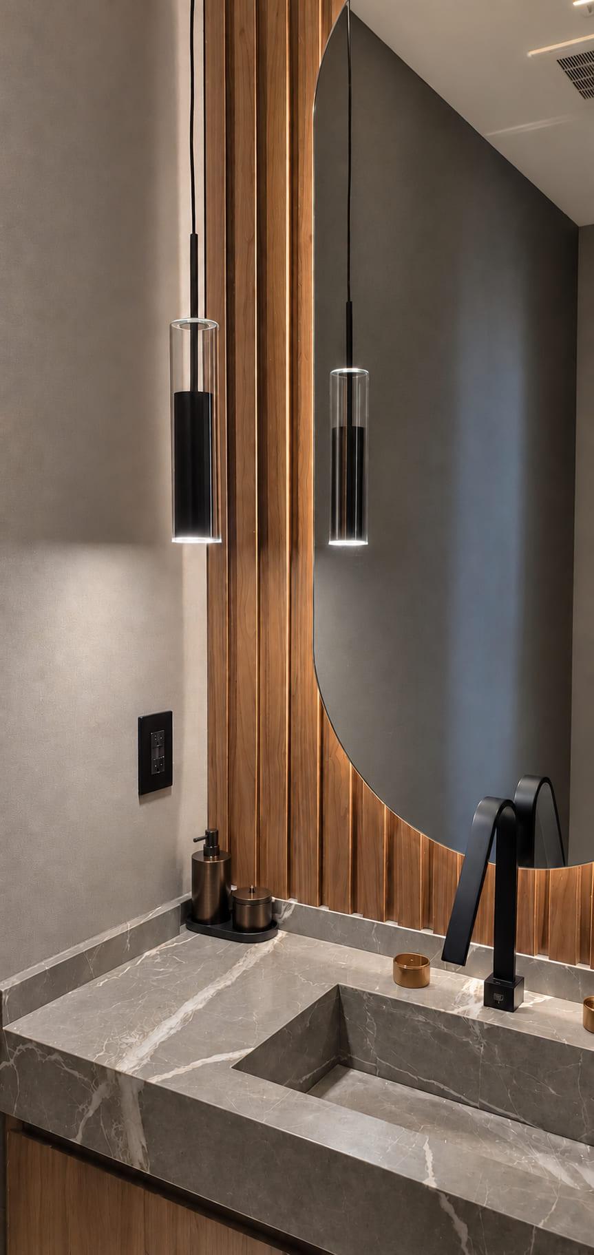 Backlit walnut fluting behind an oval mirror